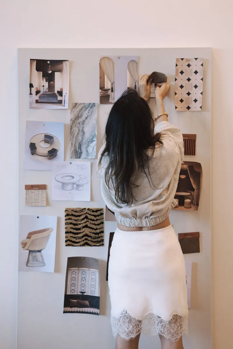 Deborah Guttieres pinning samples to a mood board