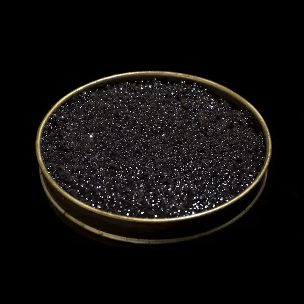 Open tin of caviar