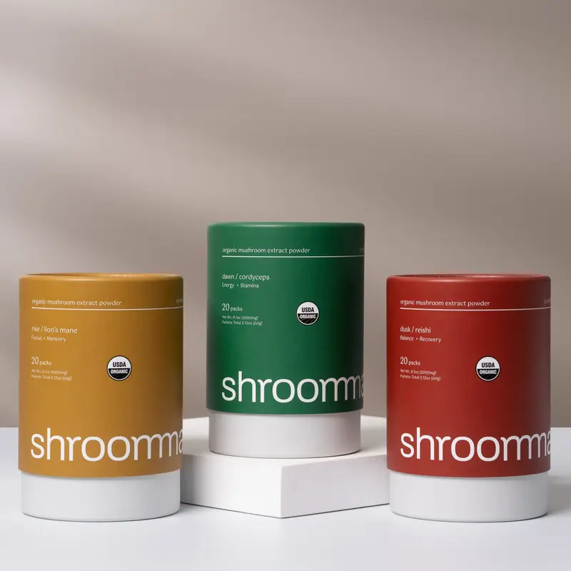 Three Shroommate canisters on white plinths
