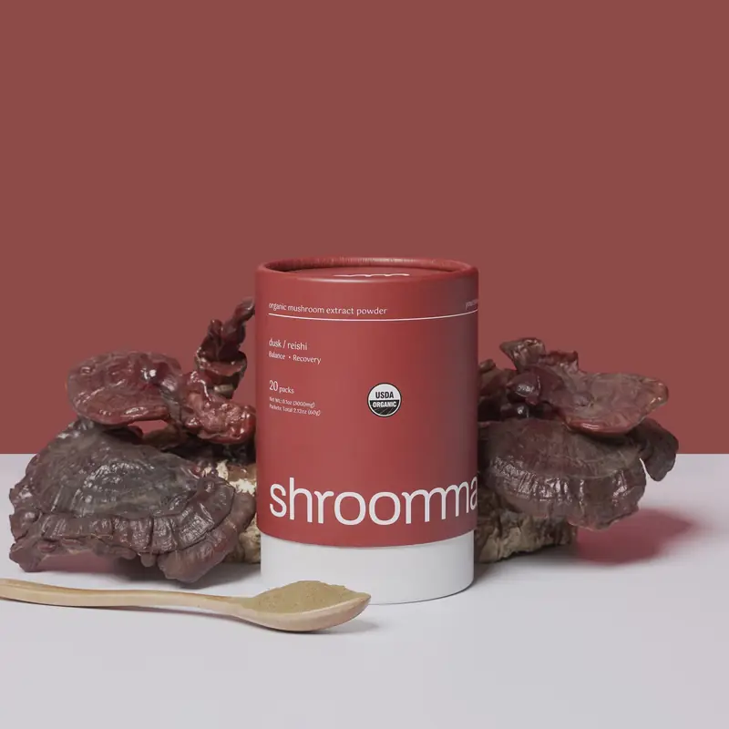 Red Shroommate canister with reishi mushrooms