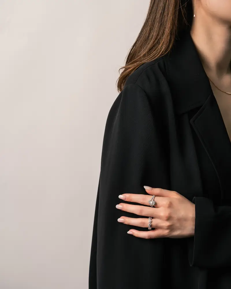 Model in black showing a ring