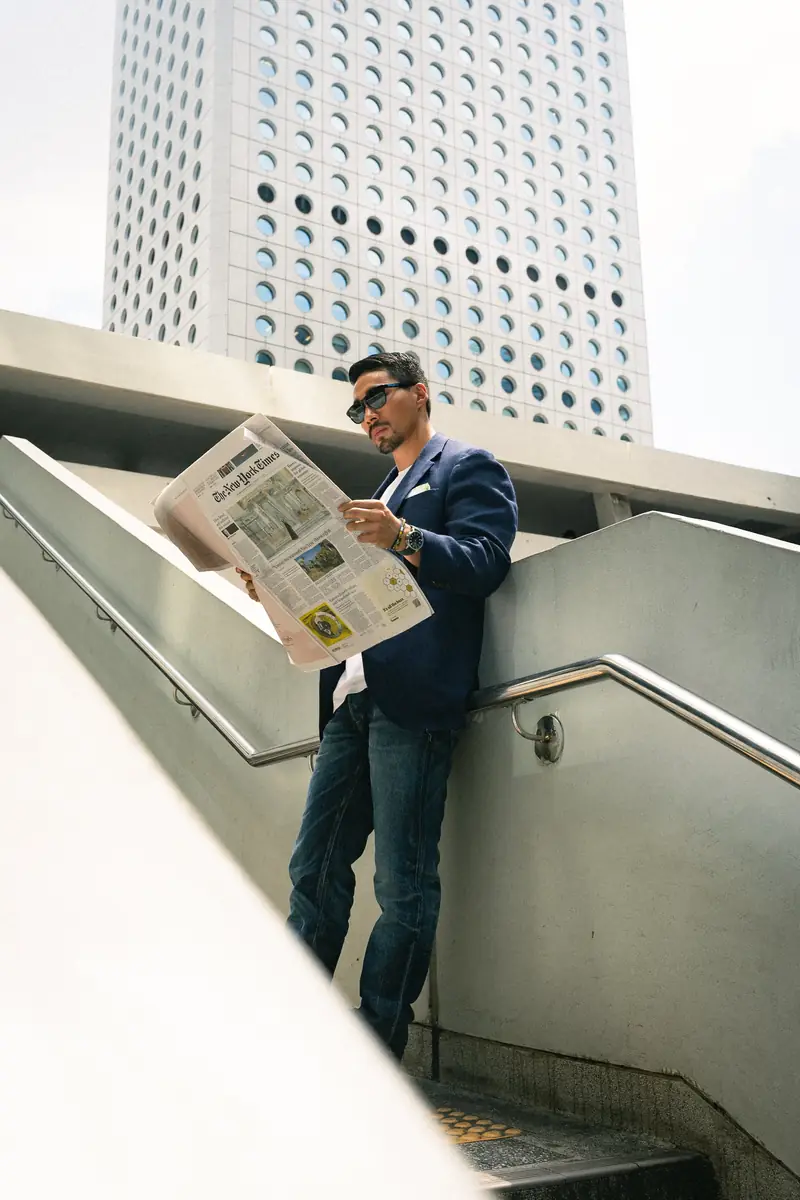 Model in denim on a city staircase